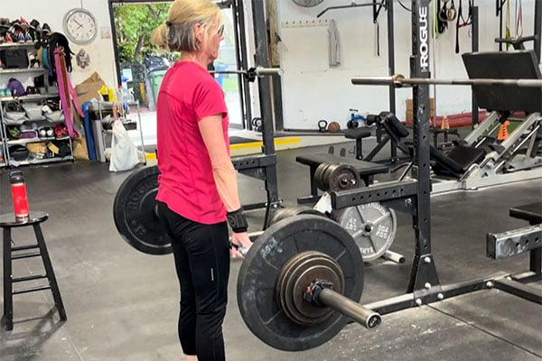 lh finishes a deadlift in training